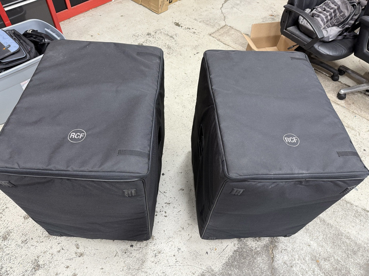 2 RCF Sub 8003-AS MK3 18" subwoofers with Covers and Casters