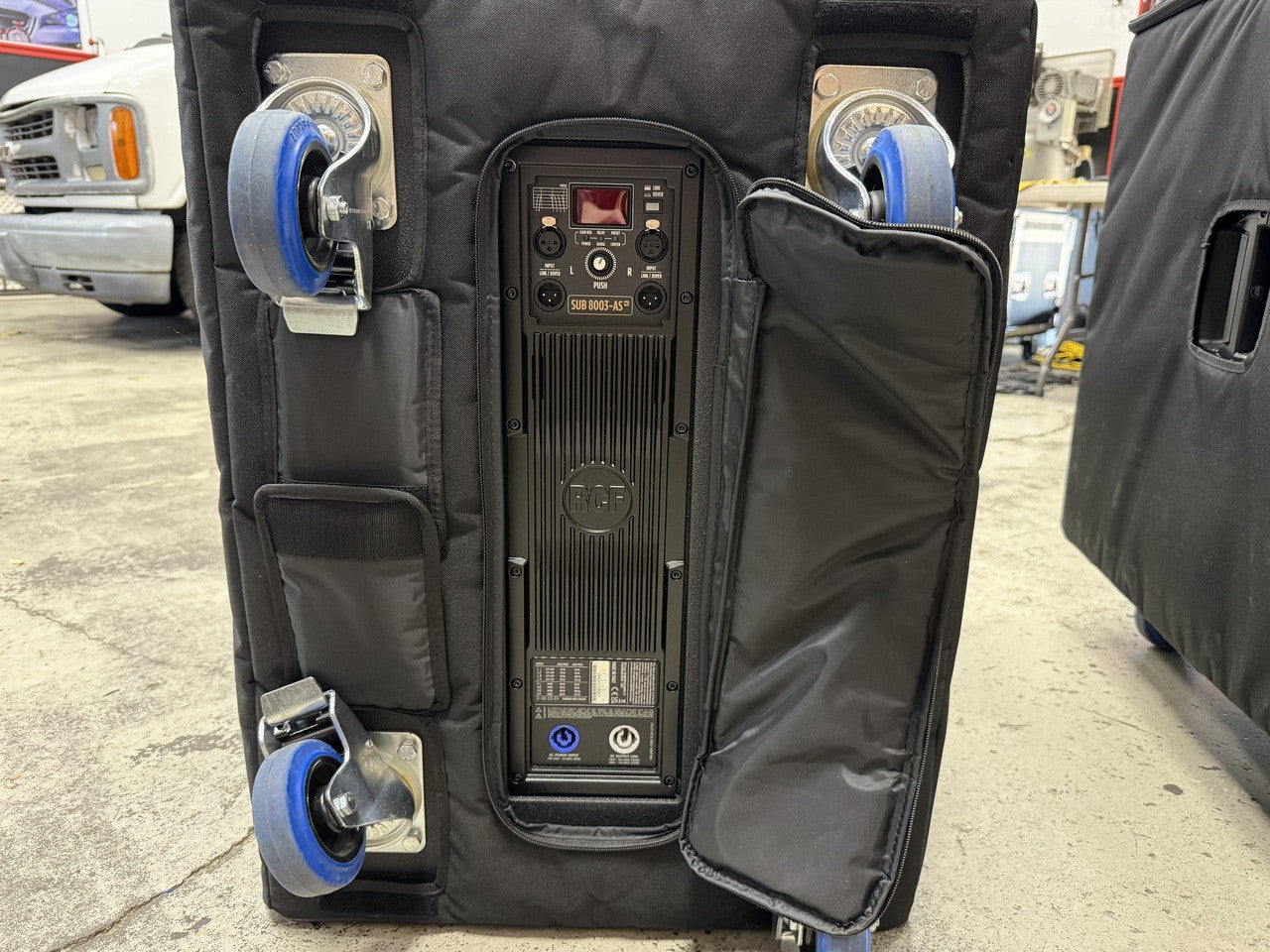 2 RCF Sub 8003-AS MK3 18" subwoofers with Covers and Casters
