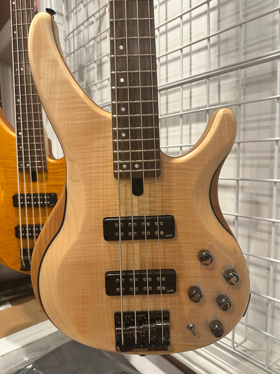 Yamaha TRBX604FM NS Natural Satin 4 string electric bass guitar display