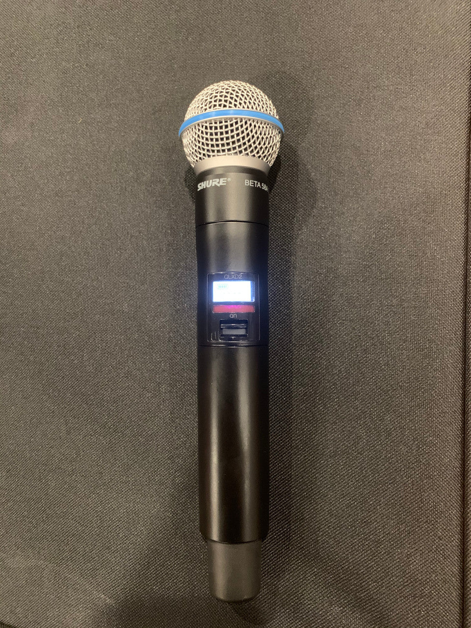 (1) Shure QLXD4-J50, (1) QLXD-2 Beta58 , (1) QLXD-1 Body Pack