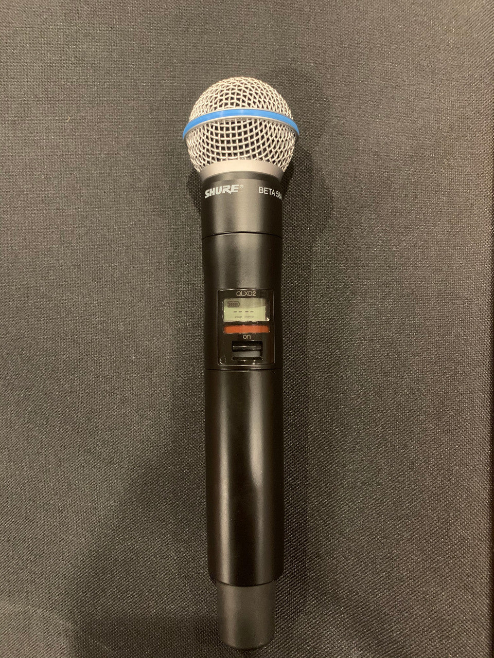 (1) Shure QLXD4-J50, (1) QLXD-2 Beta58 , (1) QLXD-1 Body Pack
