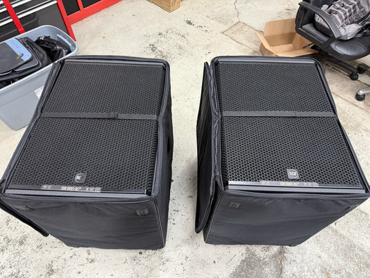 2 RCF Sub 8003-AS MK3 18" subwoofers with Covers and Casters