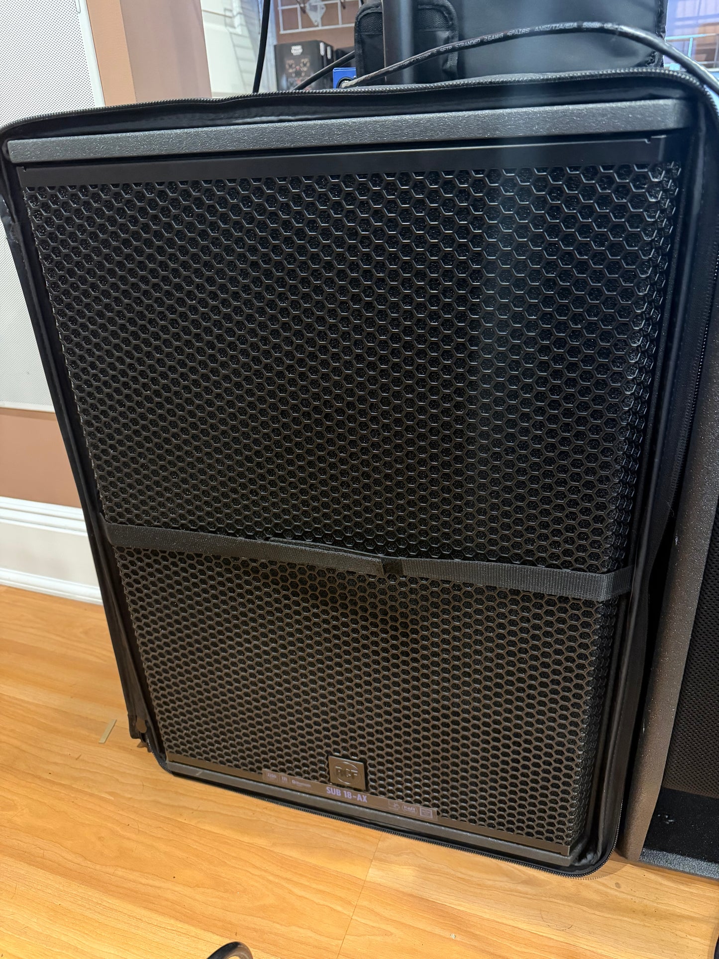 RCF SUB 18-AX Active Subwoofer with Cover, casters store display