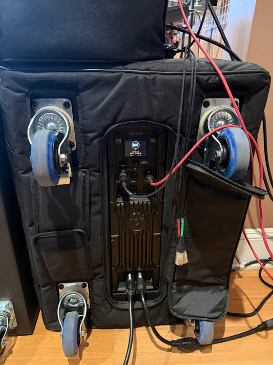 RCF SUB 18-AX Active Subwoofer with Cover, casters store display